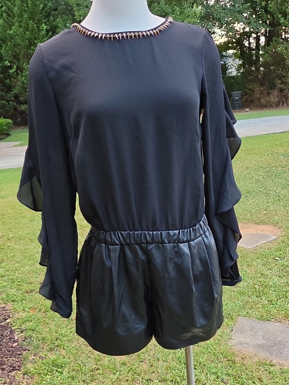 Black Ruffle-Sleeve Romper with Embellished Neckline